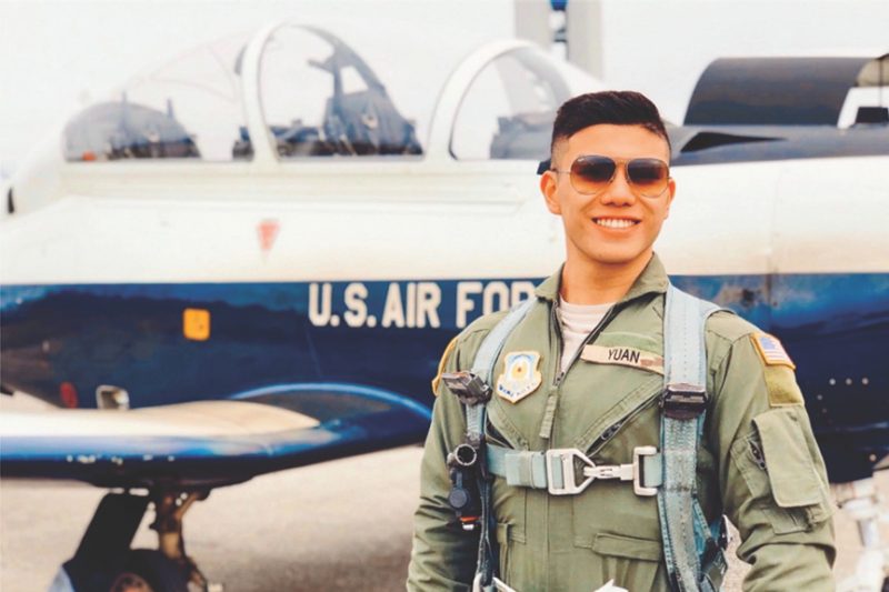 Air Force ROTC An Air Force ROTC cadet poses in front of an aircraft.