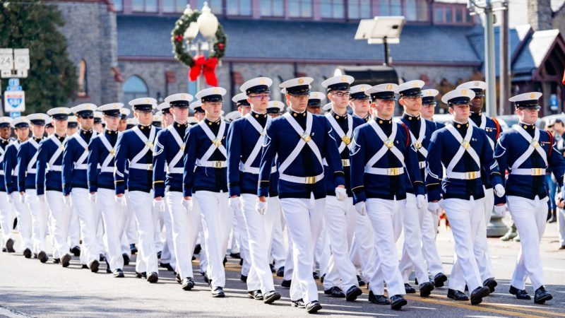 photo by Maddie Djuric VPI Battalion marches in a parade in dress uniforms.